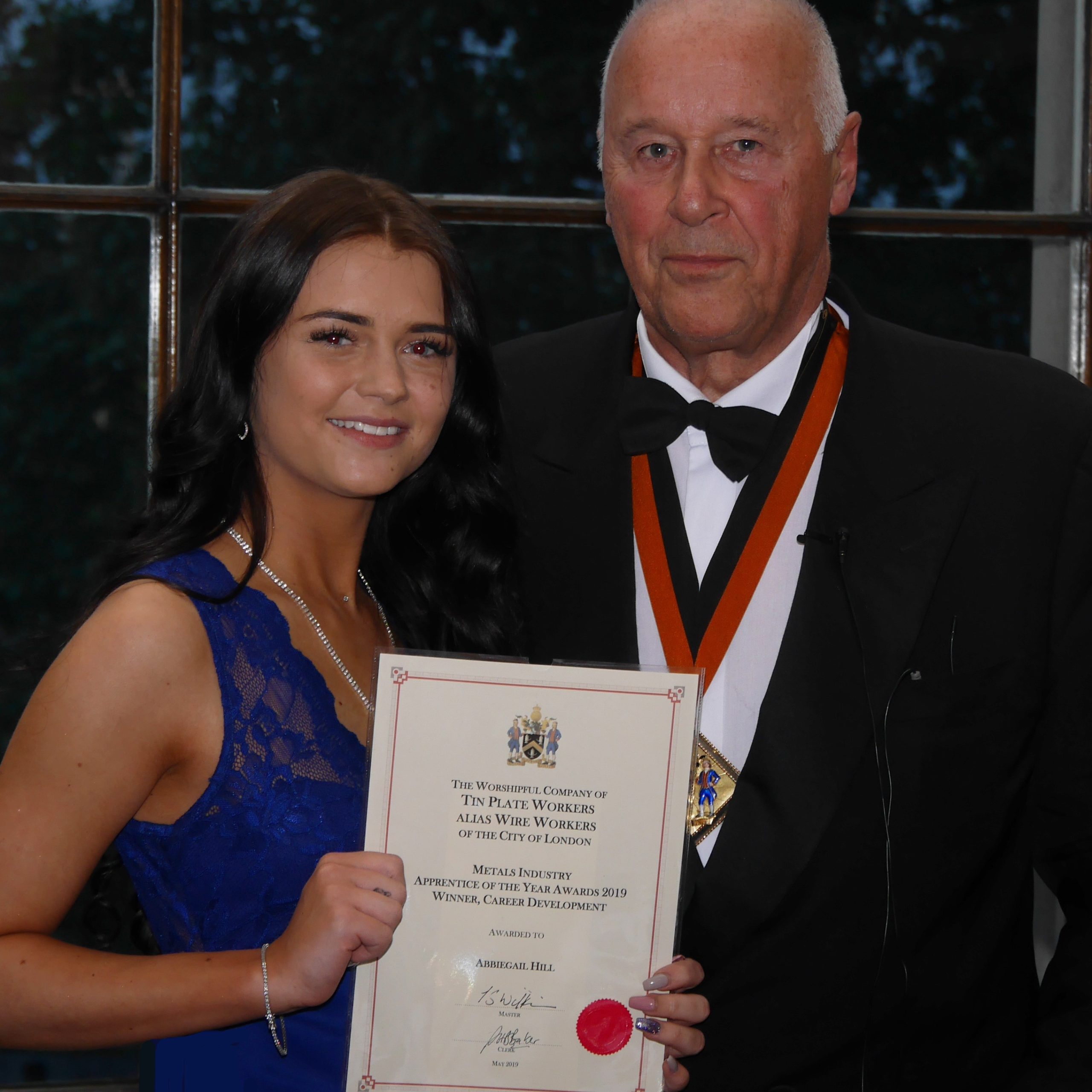 Abbiegail Hill collecting apprentice of the year award 2019